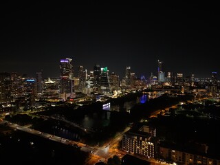 Fototapeta premium Beautiful Austin skyline at night with a stunning aerial drone view