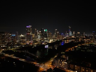 Fototapeta premium Beautiful Austin skyline at night with a stunning aerial drone view
