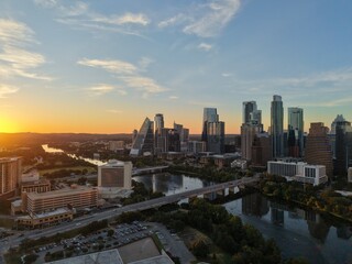 Fototapeta premium Beautiful Austin skyline during sunset with a stunning aerial drone view 