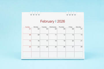 February 2026, Monthly desk calendar for 2026 year on Blue color background.