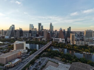 Obraz premium Beautiful Austin skyline during sunset with a stunning aerial drone view 
