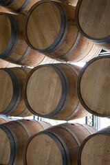 Traditional wooden barrels for storing wine or alcohol, side view
