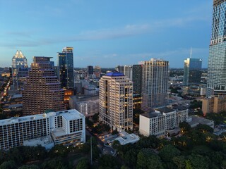 Fototapeta premium Beautiful Austin skyline during sunset with a stunning aerial drone view 
