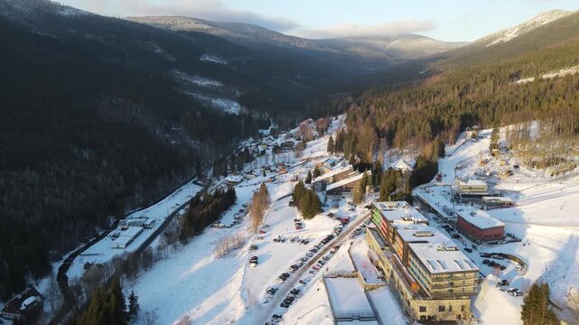 Drone video of the winter ski resort of Doln&iacute; Morava, Czech Republic. Aerial footage of the snowy winter landscape, forests and ski slopes.