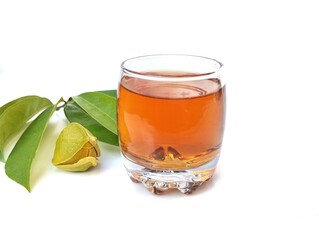 Soursop leaf boiled water in glass on white background. Healthy drink lifestyle