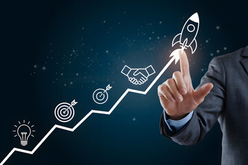 Business Growth and Success: A Hand Launches a Rocket to New Heights