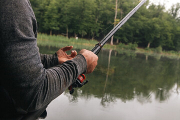 a man fishing on the lake