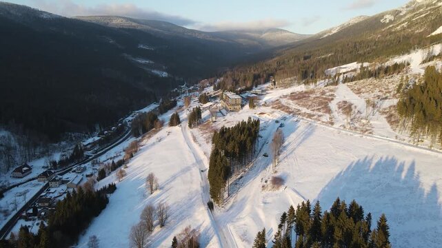 Drone video of the winter ski resort of Doln&iacute; Morava, Czech Republic. Aerial footage of the snowy winter landscape, forests and ski slopes.