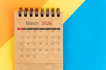 March 2026 brown color mini calendar on colorful background.