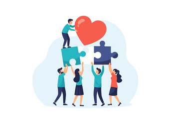 A team of people working together to build a heart-shaped puzzle.