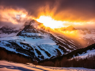View of sunrise on the snow mountain in the winter season with snowy valley and forest