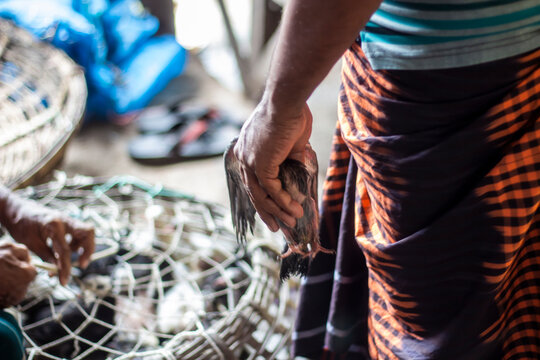 A man shows his hand and five fingers