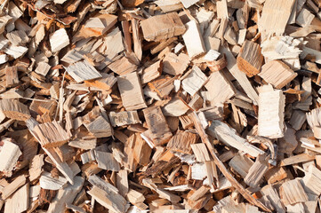 The photo shows a close-up of wood chips