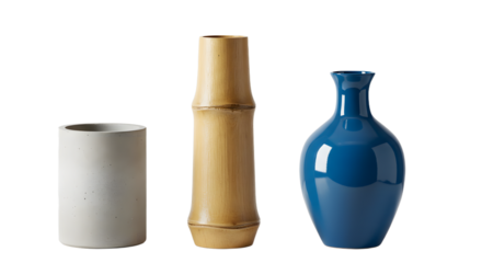 Three decorative vases in varying shapes and colors placed on a clean surface, showcasing modern design aesthetics