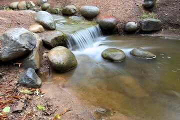 water flowing into the rocks
