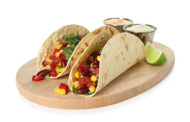 Tasty vegetarian tacos with beans, vegetables, sauces and lime isolated on white