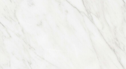 Obraz premium A bright white marble surface with soft, subtle grey veins creating an elegant and luxurious textured background.