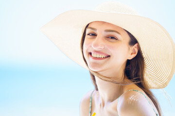 Beautiful caucasian woman smiles to camera.