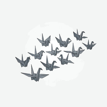 A flock of grey origami paper cranes flying in formation.