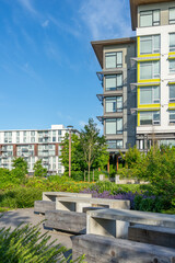 Modern apartment building with nice summer landscape in Vancouver, Canada, North America. Day time...