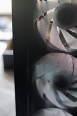 A powerful custom-built gaming PC featuring a high-airflow case design, multiple cooling fans, and...