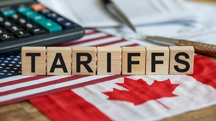 Global trade impact: Tariffs affecting business between USA and Canada with calculator and financial reports