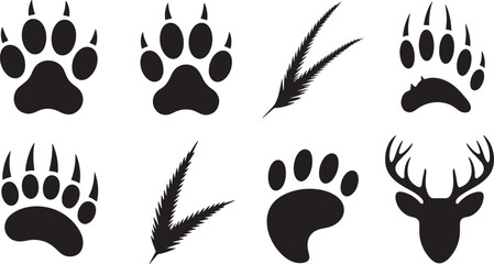 Fototapeta premium Wilderness Adventure Set Black Silhouettes of Animal Tracks, Antlers, and Feathers on Transparent