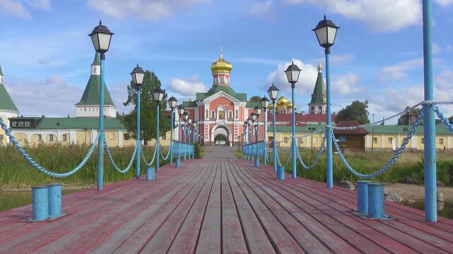 View of the Valdai Iversky Bogoroditsky svyatoozersky monastery. Sunny June day . Russia,Ancient Russian Iversky Monastery at Valdaysky National Park.