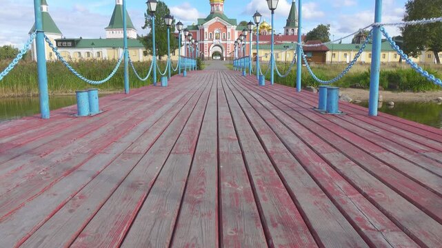 View of the Valdai Iversky Bogoroditsky svyatoozersky monastery. Sunny June day . Russia,Ancient Russian Iversky Monastery at Valdaysky National Park.