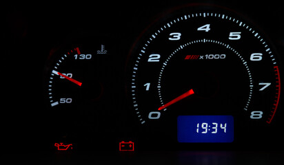speedometer on black background
