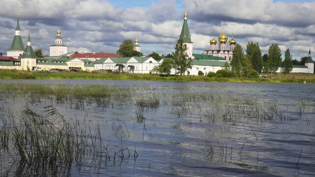 View of the Valdai Iversky Bogoroditsky svyatoozersky monastery. Sunny June day . Russia,Ancient Russian Iversky Monastery at Valdaysky National Park.