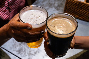 beer with cheers at the bar