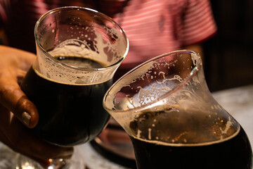 dark beers on the table at the bar