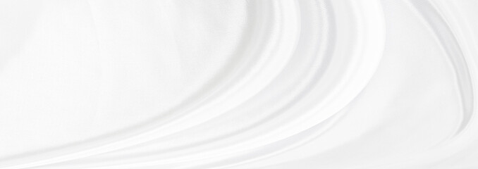 White gray satin texture that is white silver fabric silk background with beautiful soft blur pattern natural.