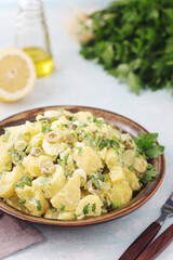 A bowl with Greek potato salads