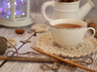 Cup of tea doily decor design crochet knitting woman's objects things on table cozy photo 