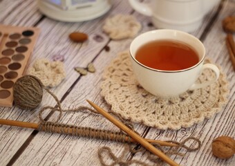 Cup of tea doily decor design crochet knitting woman's objects things on table cozy photo 