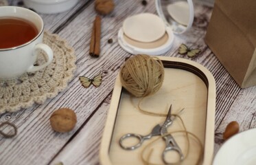 Knitting and a cup of coffee tea handmade art decor design retro style photo 