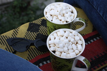 white cup of coffee and cookies