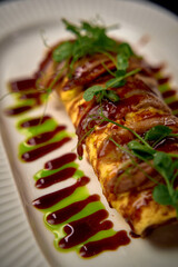 Exquisite Gourmet Dish Served on a Plate with Colorful Sauces and Fresh Garnish Enhancing Presentation and Flavor Profile