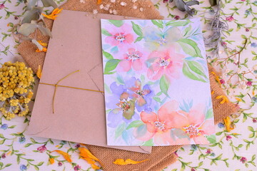 Floral wedding invitation card hand painted watercolor illustration pink blue green color flowers...