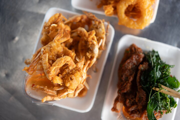 Deep fried soft shell crab served with many food, Thai food