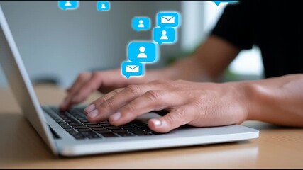 Engaging in online communication through instant messaging and email on a laptop - Powered by Adobe