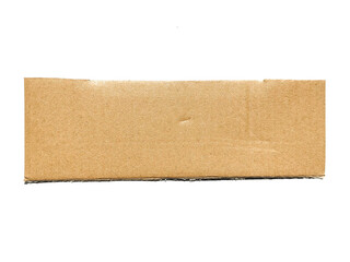 A piece of cardboard with a textured striped pattern, kraft paper for wrapping on a white background. The edges of the cardboard are torn and wavy brown. Top view of recycled cardboard texture.