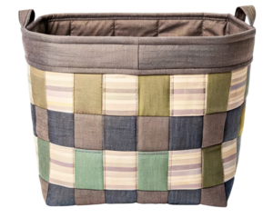 Quilted patchwork fabric bin for home organization and storage on a transparent background