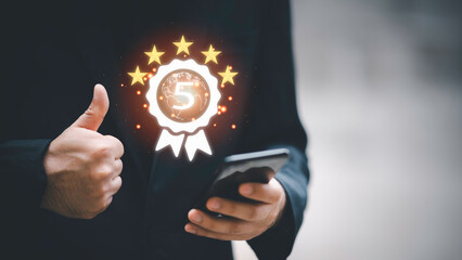 Businessman shows the sign of the top service Quality assurance 5 star, Guarantee, Standards, ISO certification and standardization concept, the best of product and service, the best quality very good