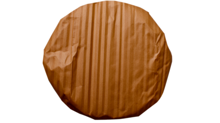 Round brown paper wrapped in textured design for packaging purposes