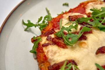 Deliciously Crafted Dish Featuring Melted Cheese, Crispy Bacon, and Fresh Arugula on a Golden Crust, Perfect for Culinary Enthusiasts and Food Lovers