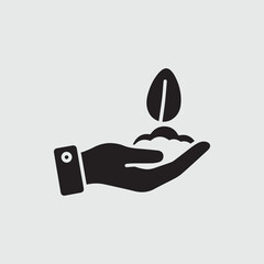 Hand holding soil and seed icon symbolizing growth and agriculture
