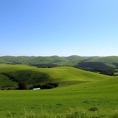 Naklejka premium Beautiful shot of green landscape of the Clee Hills aria under blue clear sky
